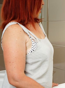 Horny housewife masturbating in her bathroom