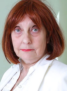 Naughty British mature lady getting wet on her bed