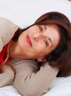 Naughty mature lady playing with herself