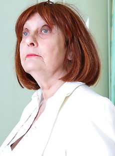 Naughty British mature lady getting wet on her bed