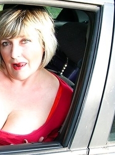 Big breasted mature Monieka gets naughty outside