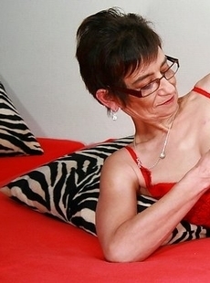 Naughty mature slut playing with herself