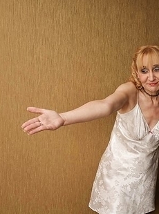 mature woman riding a hard pole