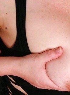 Big breasted mama playing with herself