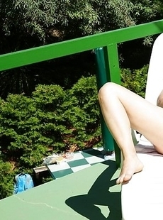 Horny mature slut playing with herself in the sun