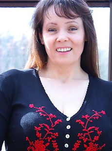 Big breasted British housewife getting wet