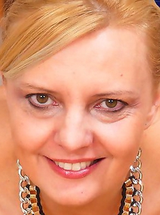 This housewife loves to get naughty in her kitchen