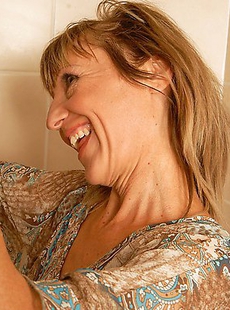 Horny mature slut fucking on a toilet