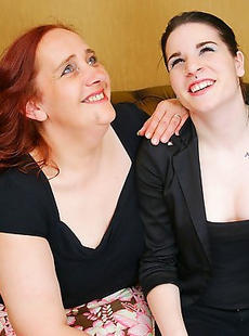 Old and young lesbian couple go at it