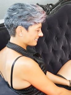 Old and young lesbian couple make out on the couch