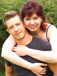 Naughty housewife playing with her toyboy outside