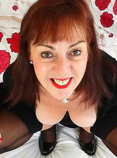 Horny British mature slut playing with herself